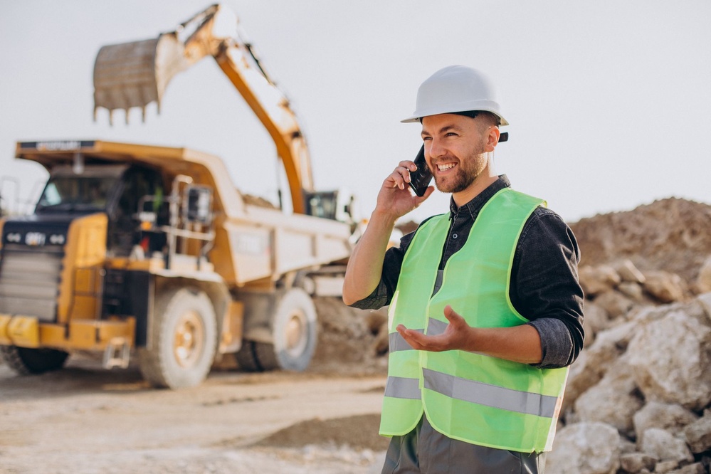 Ouvrier RJ Location au bulldozer sur un chantier en Wallonie